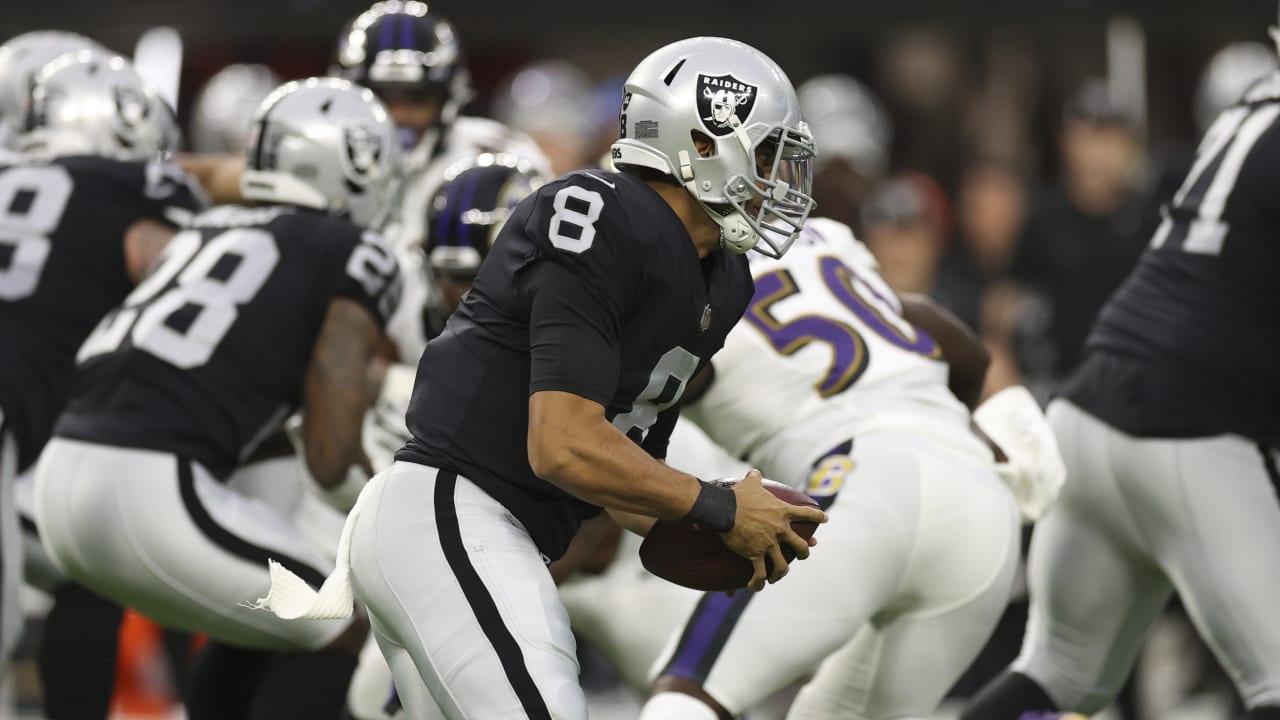 Raiders quarterback Marcus Mariota (8) dives for yardage against the  Indianapolis Colts in the …