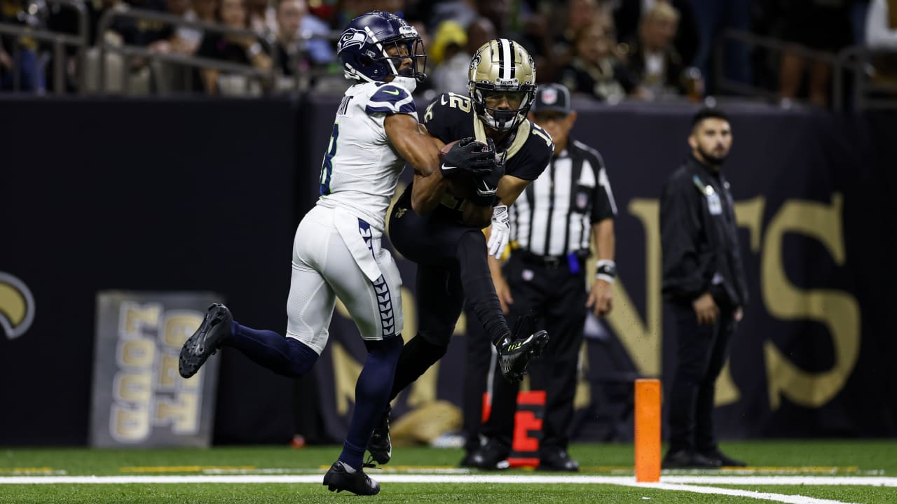 New Orleans Saints wide receiver Chris Olave bodies fellow rookie Seattle  Seahawks cornerback Coby Bryant for TD catch