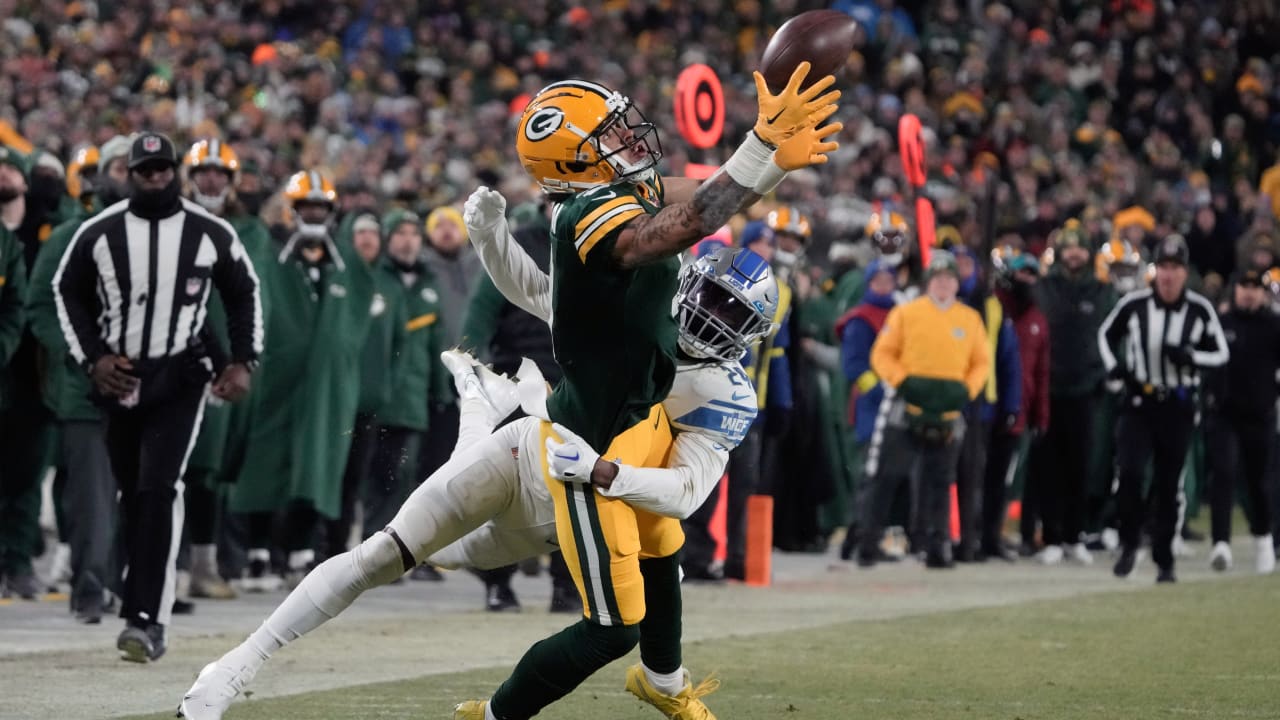 Green Bay Packers' Christian Watson runs a drill during NFL