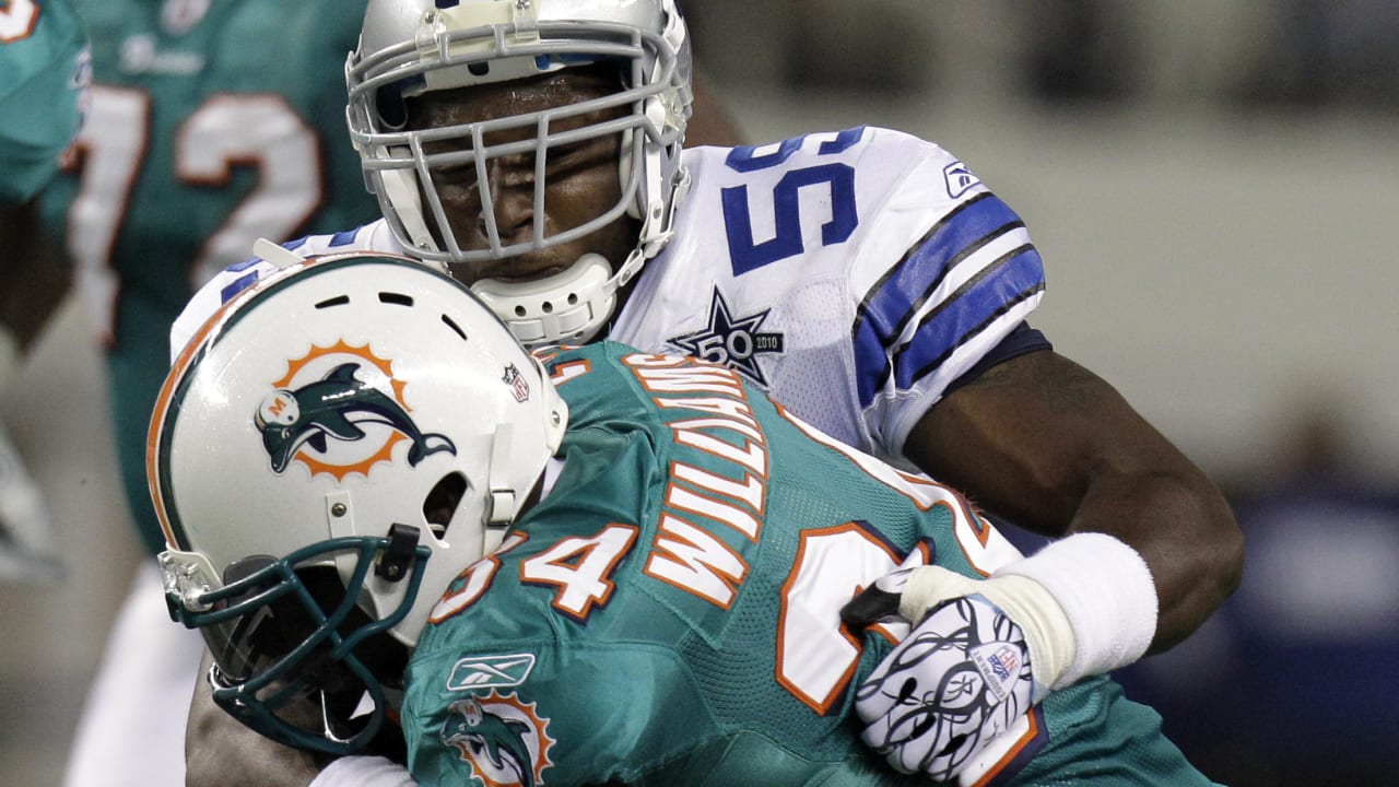 Miami Dolphins wide receiver Brandon Marshall (19) is congratulated by wide  receiver Davone Bess (15) following a reception by Marshall in the second  half of an NFL football game against the Dallas