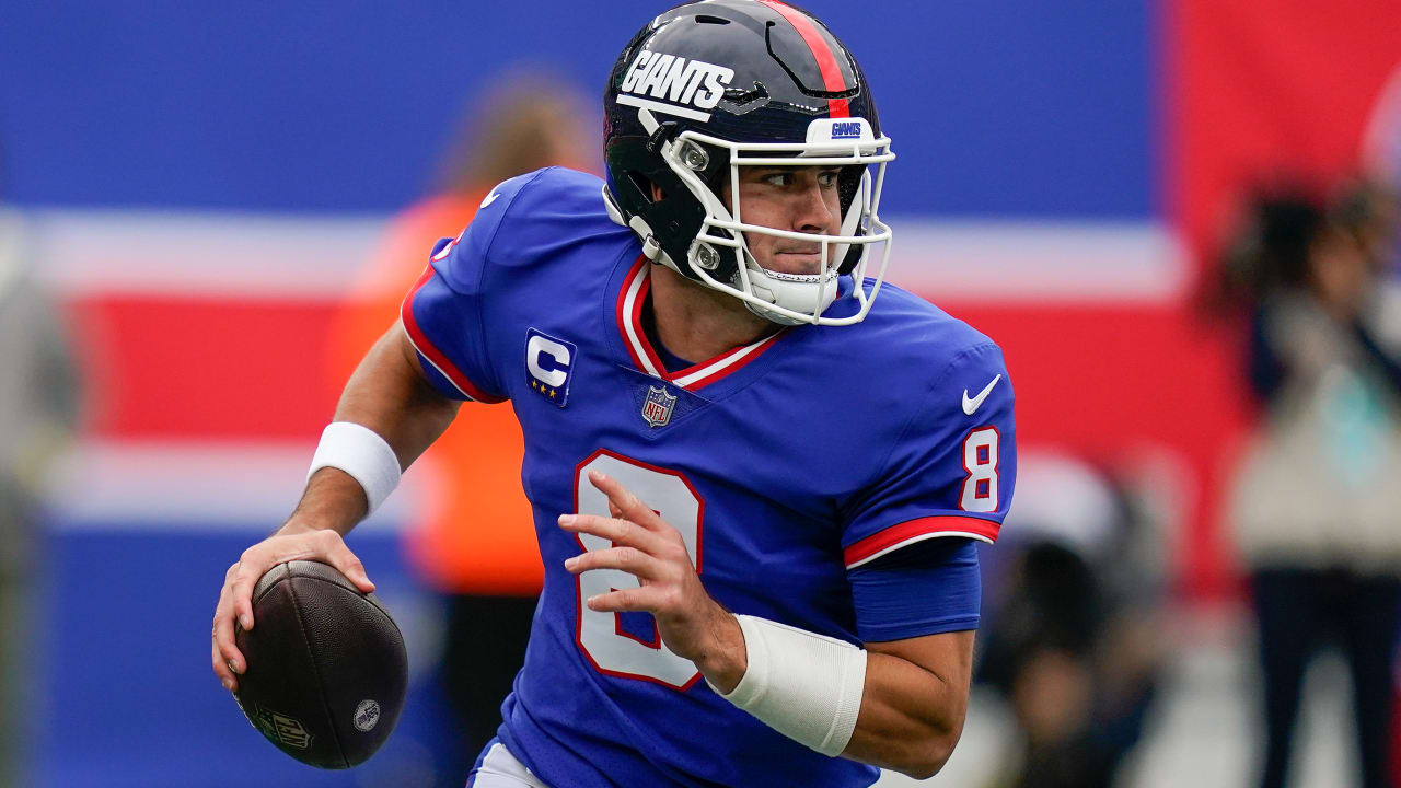 New York Giants quarterback Daniel Jones (8) runs downfield with the ball  during the first half of an NFL football game against the Washington  Football Team, Thursday, Sept. 16, 2021, in Landover