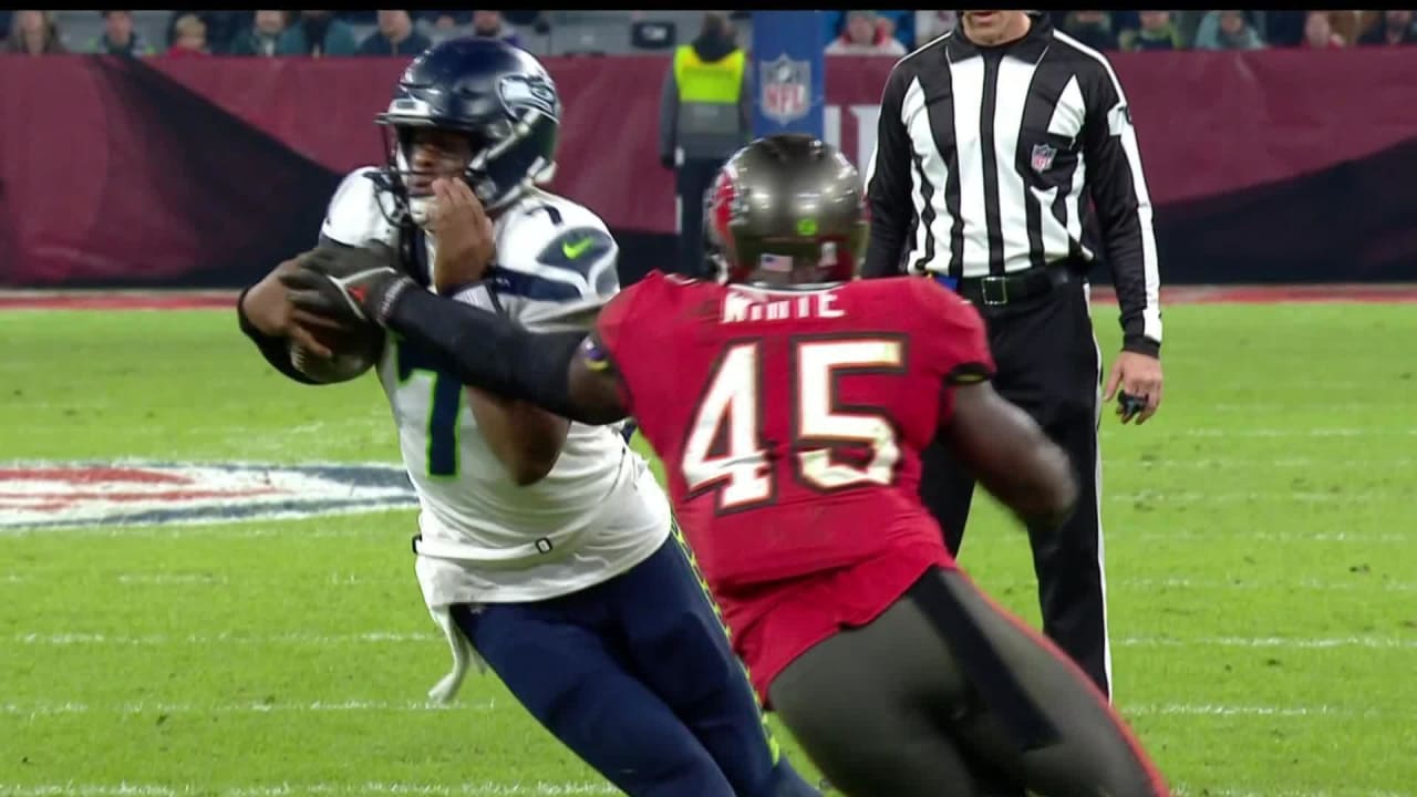 Tampa Bay Buccaneers linebacker Devin White rips the ball away from ...