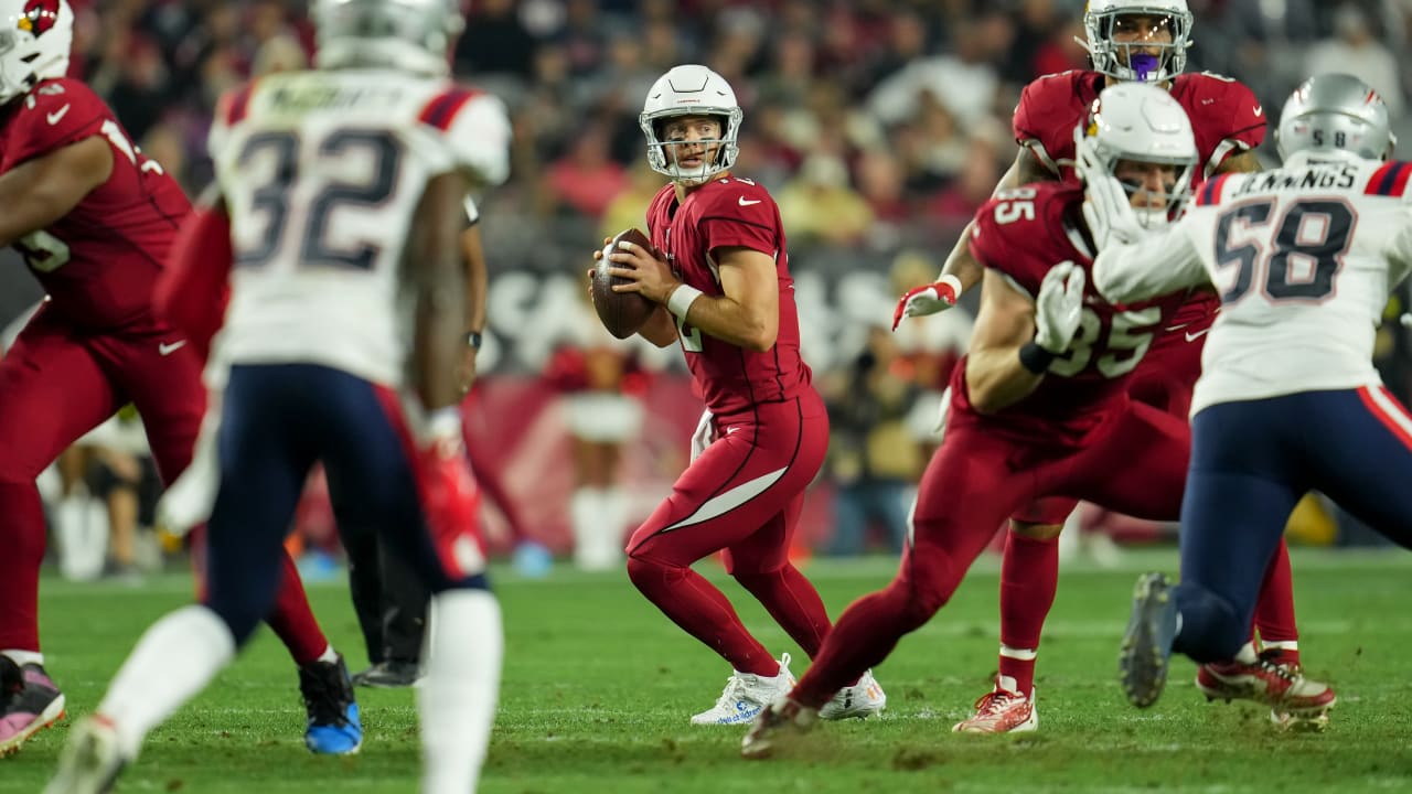 Arizona Cardinals running back Corey Clement, left, runs against