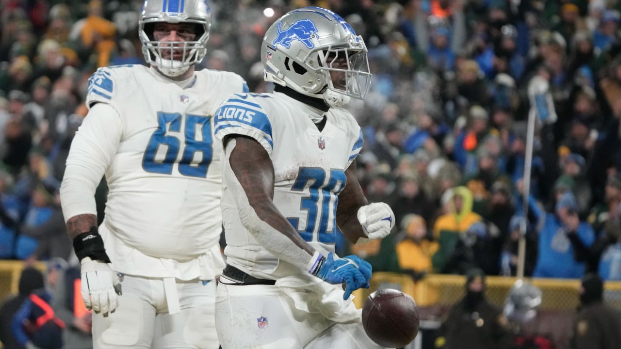 Detroit Lions running back Jamaal Williams runs with teh ball during an NFL  football game against the Seattle Seahawks, Sunday, Jan. 2, 2022, in  Seattle. The Seahawks won 51-29. (AP Photo/Stephen Brashear