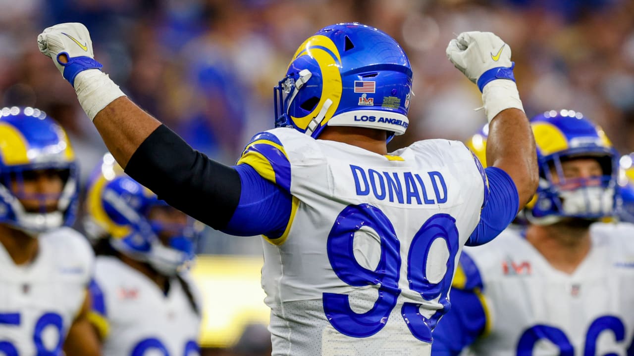 Los Angeles Rams defensive lineman Aaron Donald explodes through a double  team on way to sack of Cincinnati Bengals quarterback Joe Burrow