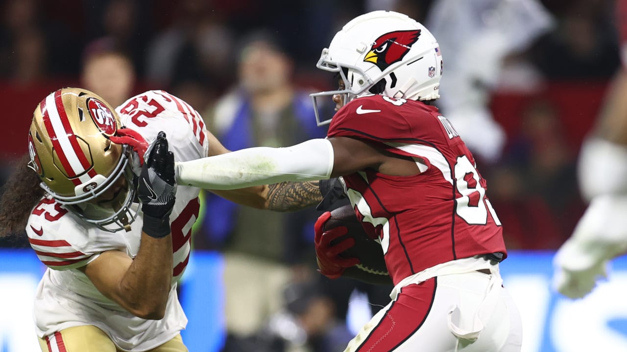 Greg Dortch of the Arizona Cardinals avoids a tackle after making