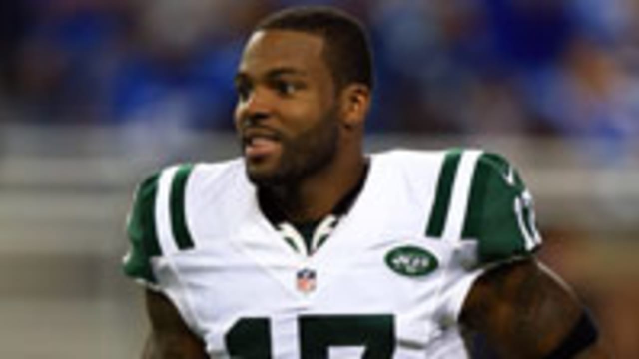 New York Jets wide receiver Braylon Edwards is lifter up by