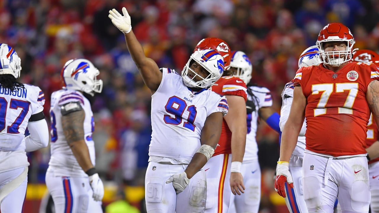 Buffalo Bills defensive tackle Tim Settle (99) and Bills defensive tackle  Ed Oliver (91) talk to a TV camera after beating the Kansas City Chiefs in  an NFL football game, Sunday, Oct.