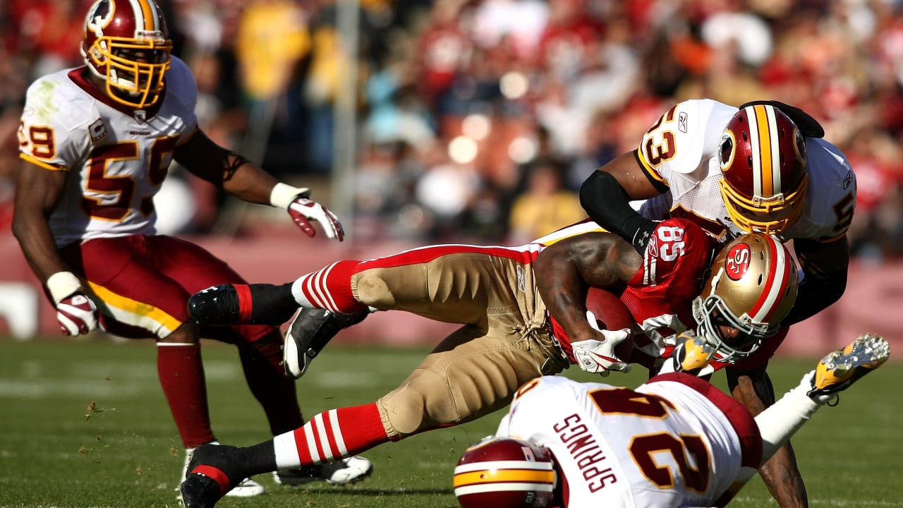 Jason Campbell of the Chicago Bears gets sacked by Justin Smith and News  Photo - Getty Images