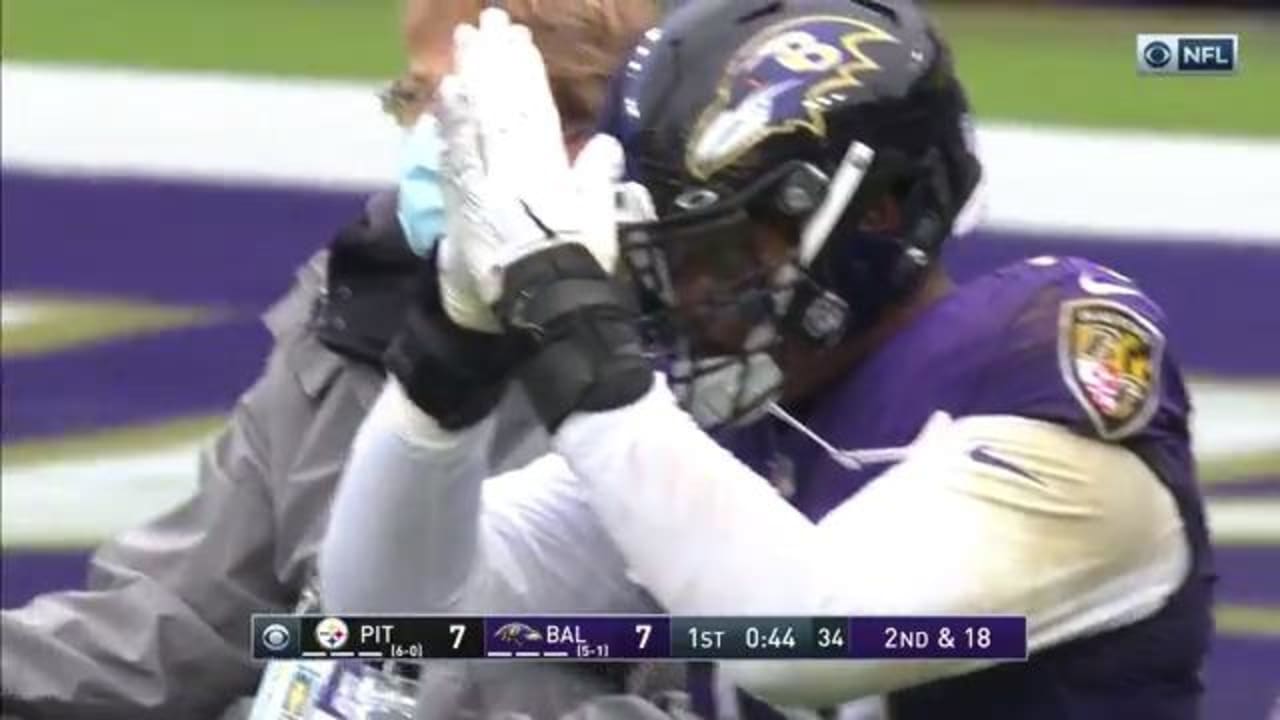 Teammates console Baltimore Ravens offensive tackle Ronnie Stanley as