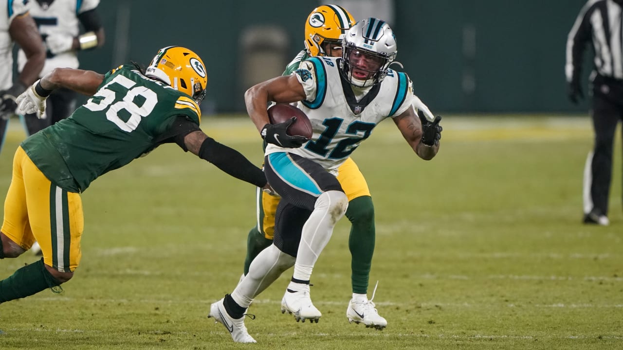 Carolina Panthers wide receiver D.J. Moore SOMEHOW pinballs off of three Green  Bay Packers for 40 yards