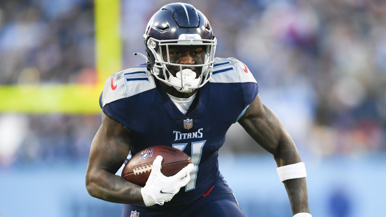 Tennessee Titans wide receiver A.J. Brown (11) runs onto the field before  an NFL divisional playoff football game against the Cincinnati Bengals,  Saturday, Jan. 22, 2022, in Nashville, Tenn. (AP Photo/Brett Carlsen