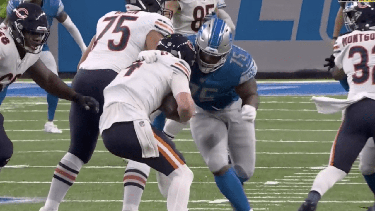 Detroit Lions defensive tackle Levi Onwuzurike warms up during