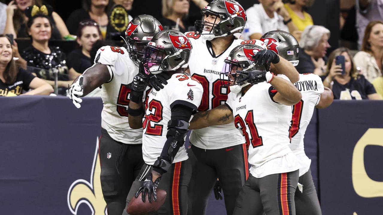 Tampa Bay Buccaneers safety Mike Edwards (32) runs to the ball as