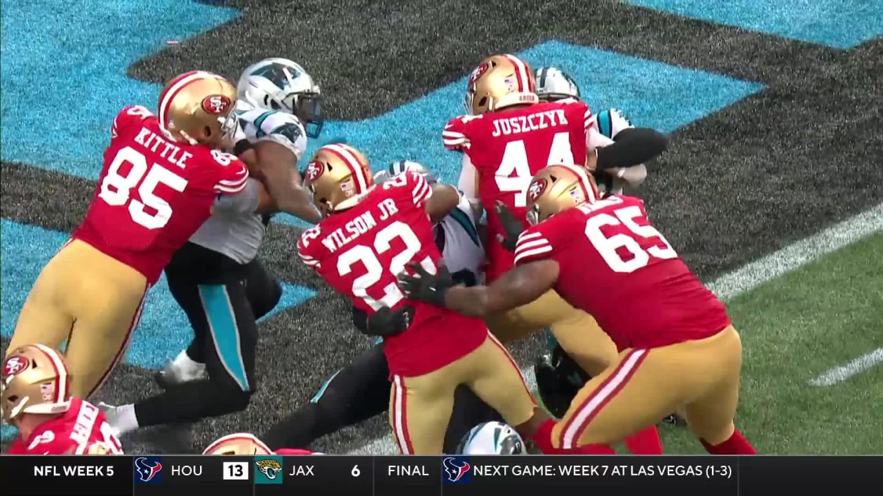 San Francisco 49ers running back Jeff Wilson Jr. shoulder-charges his ...