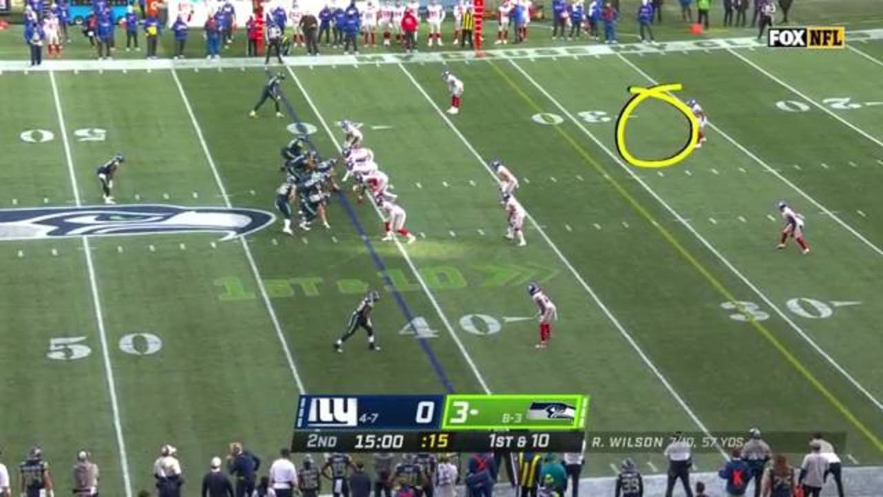 Jabrill Peppers plows through Chris Carson to sack Russell Wilson