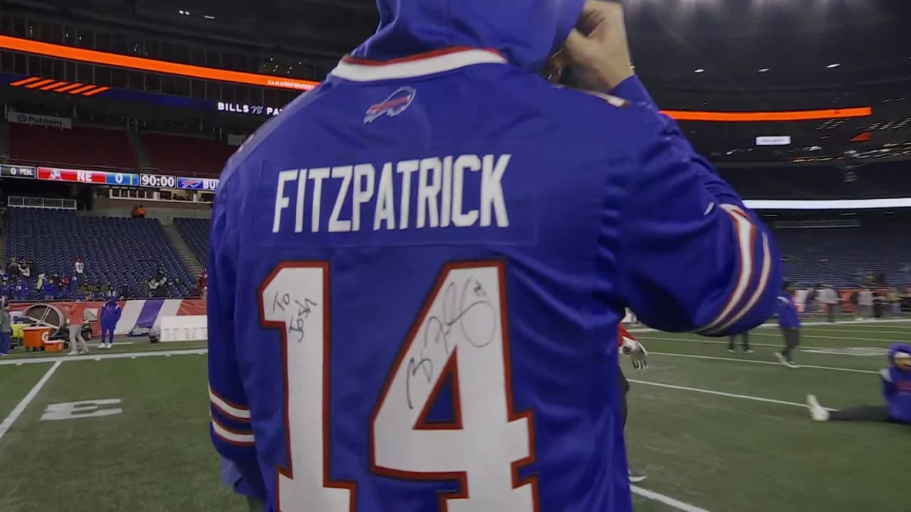 Buffalo Bills quarterback Josh Allen warms up in a signed Ryan Fitzpatrick  Bills jersey