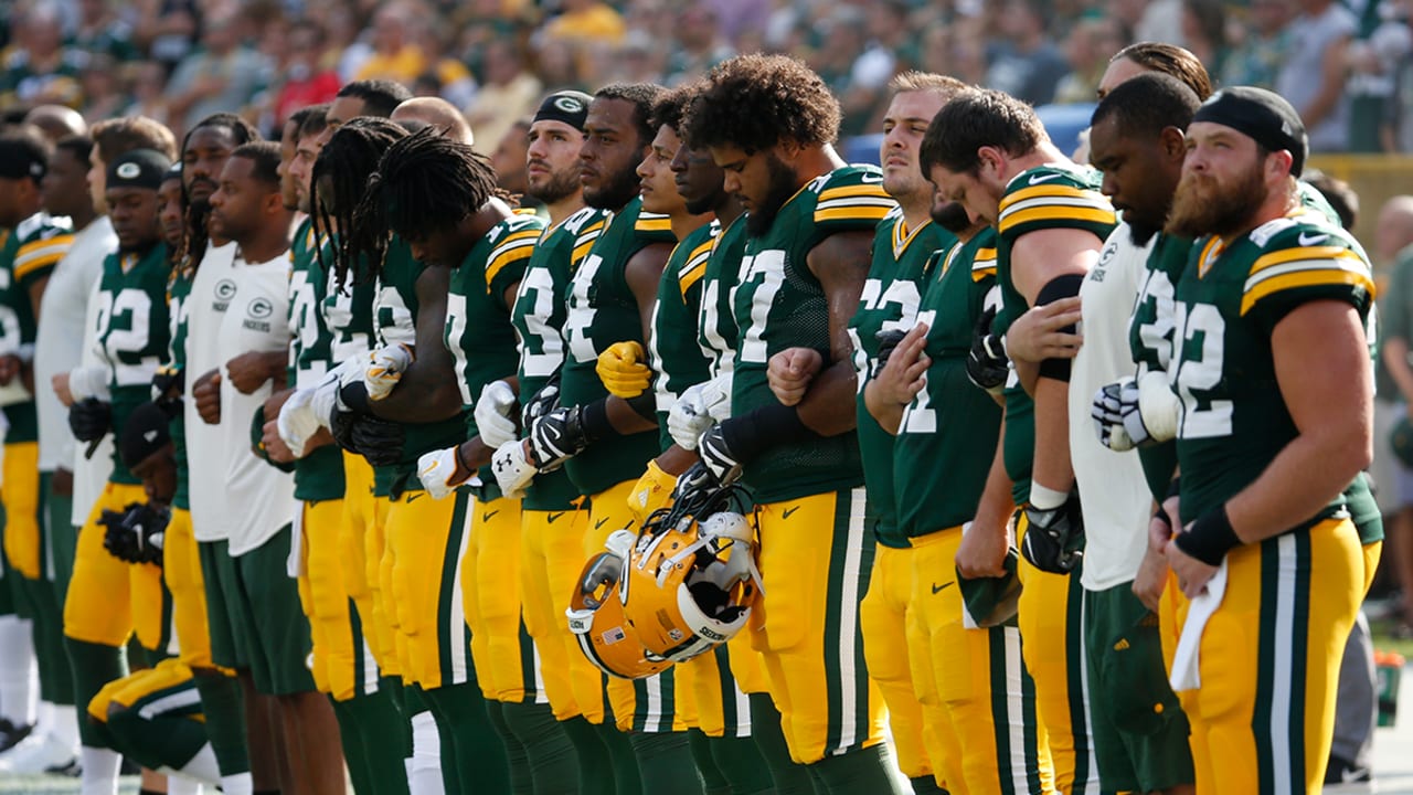 NFL players lock arms in national anthem at Cowboys-Cardinals game