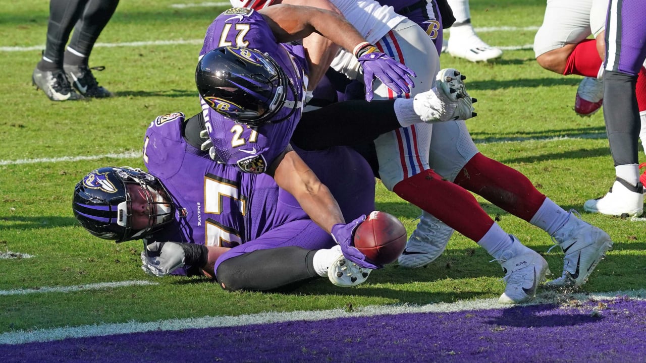 Baltimore, United States. 27th Dec, 2020. Baltimore Ravens running back J.K.  Dobbins (27) stretches across the goal line for a 2-yard touchdown against  the New York Giants during the first half at