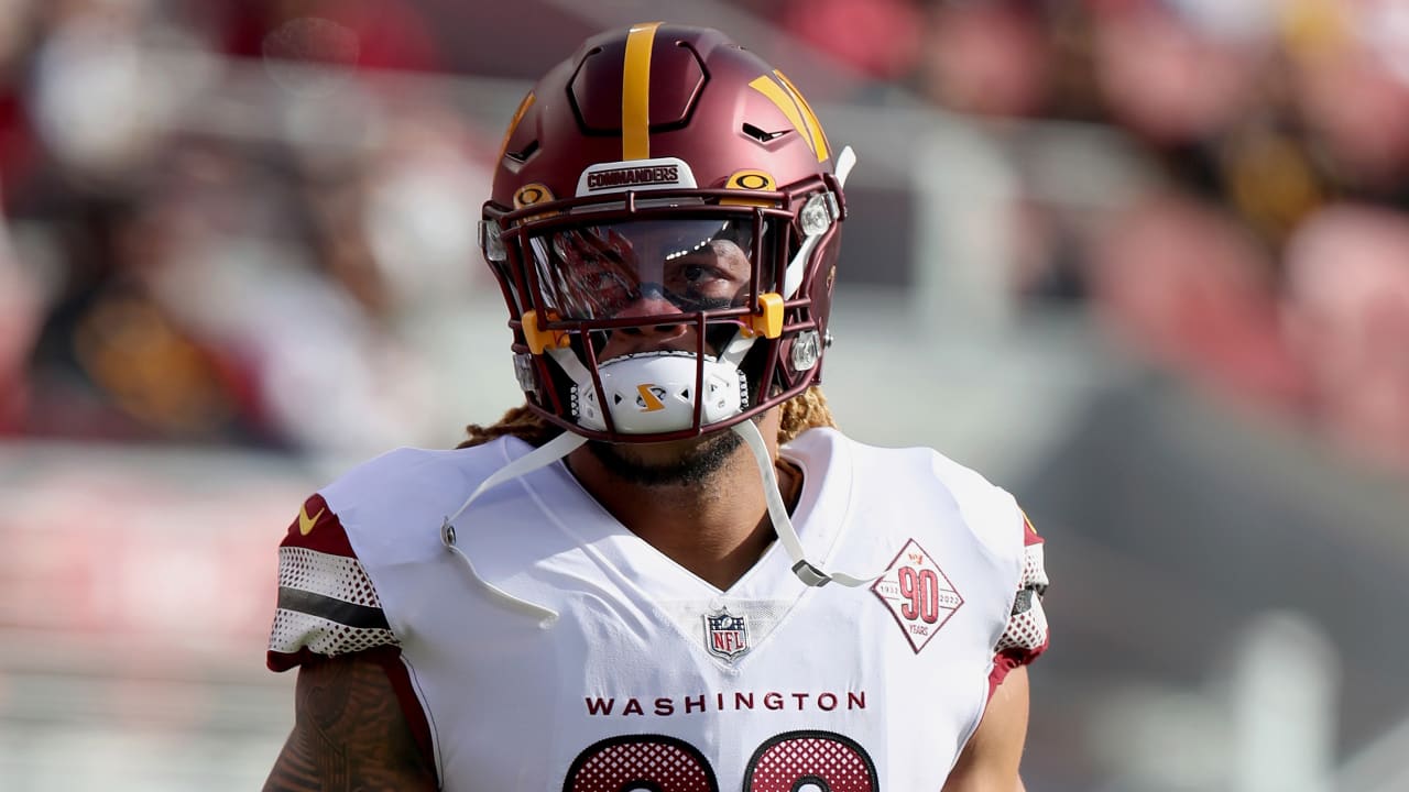 Washington Commanders defensive end Chase Young's hand gets up in the air  to block San Francisco 49ers quarterback Brock Purdy's pass at the line of  scrimmage