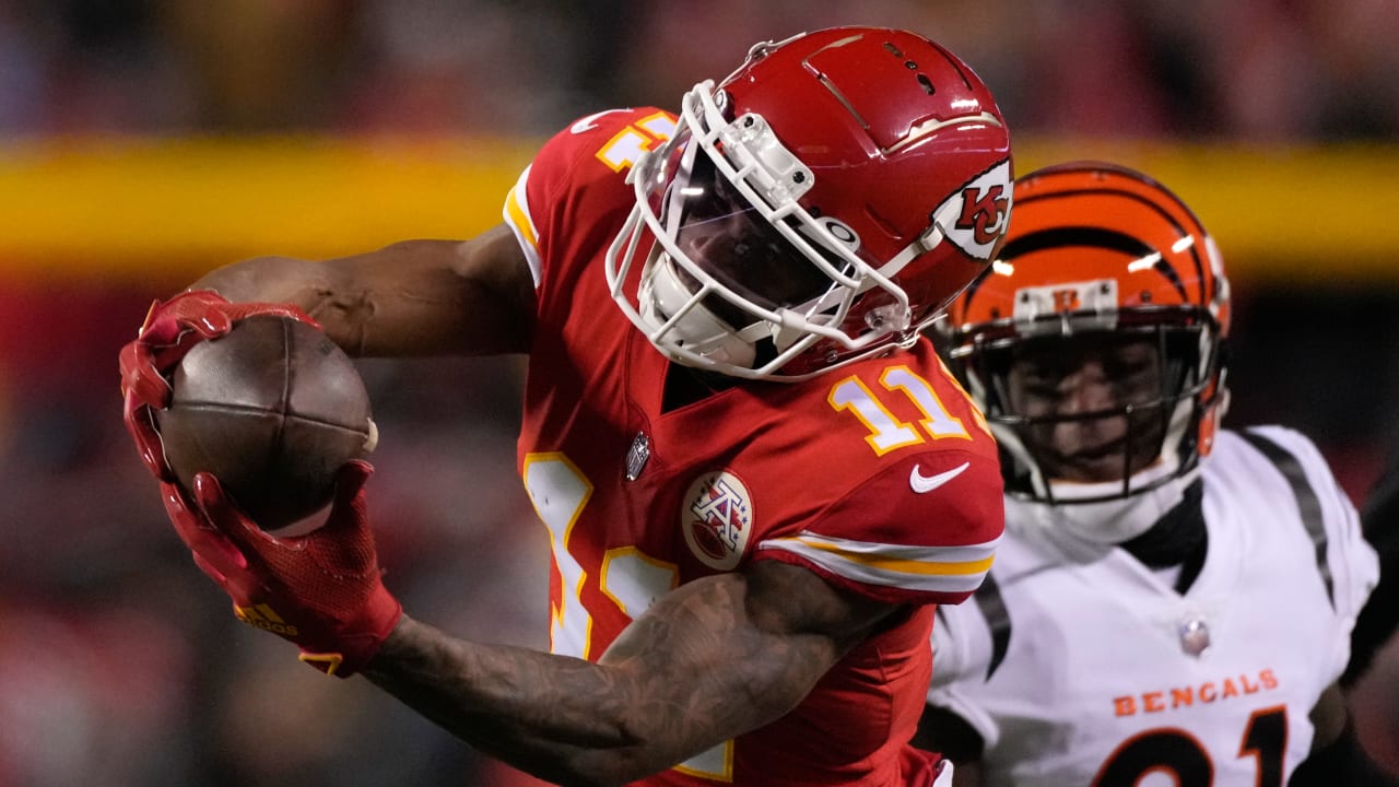 Kansas City Chiefs running back Isiah Pacheco bulldozes and spins off a  defender for an 11-yard gain