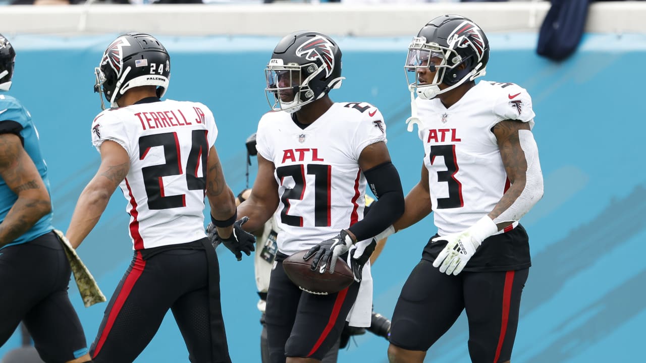 Atlanta Falcons safety Duron Harmon tracks down Jacksonville Jaguars  quarterback Trevor Lawrence's launch for deep INT