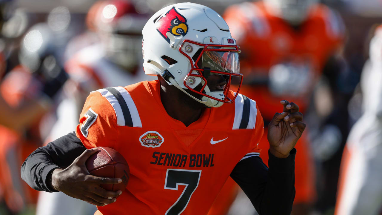 Louisville Cardinals quarterback Malik Cunningham breaks tackles and ...