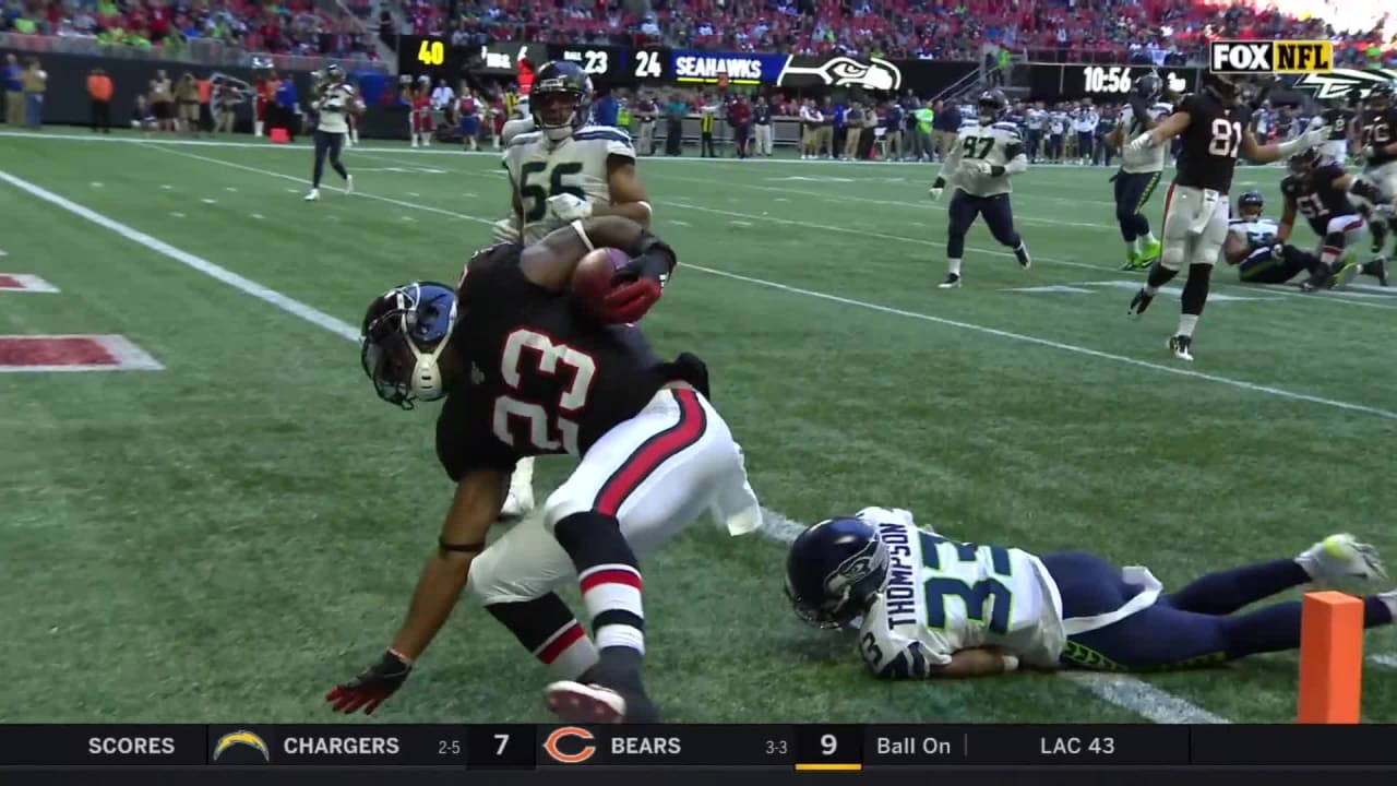 Brian Hill weaves through 'Hawks D for 23yard TD run