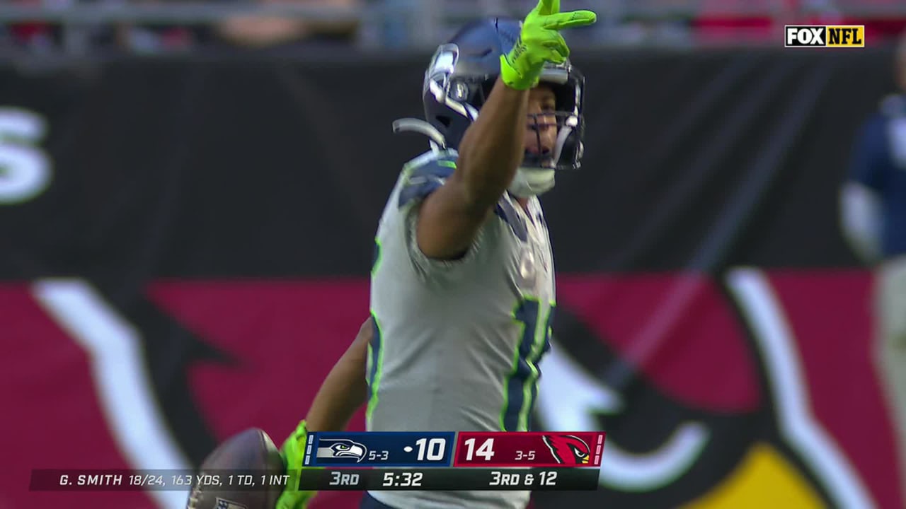 Seattle Seahawks wide receiver Tyler Lockett's 12-yard grab ends up