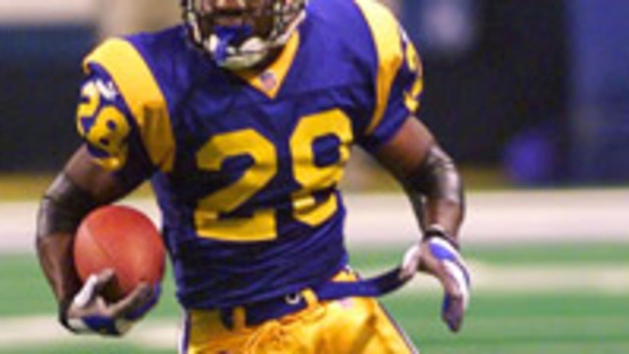 Marshall Faulk of the St. Louis Rams runs with the ball during the News  Photo - Getty Images