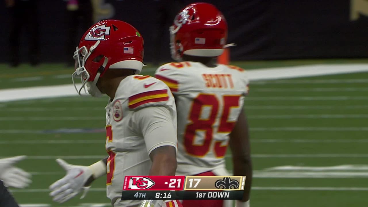 Kansas City Chiefs running back Isiah Pacheco bulldozes and spins off a  defender for an 11-yard gain