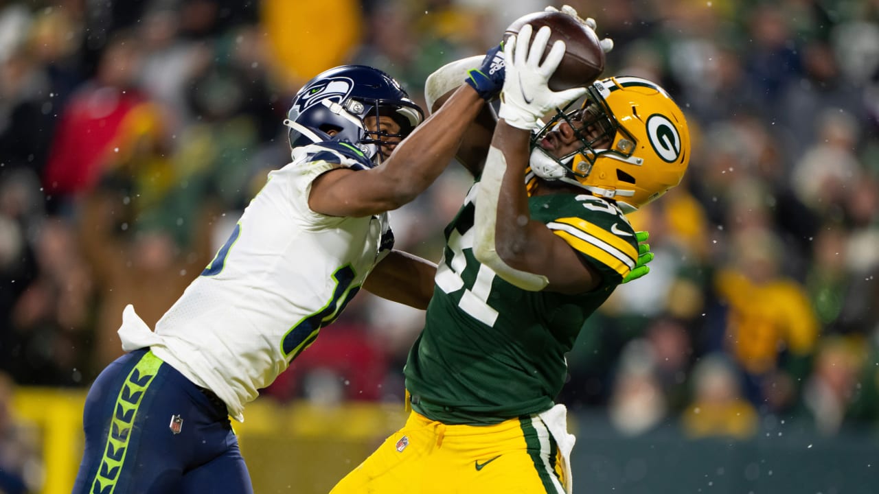 Green Bay Packers safety Adrian Amos (31) reacts after an interception  during an NFL divisional playoff football game against the San Francisco  49ers, Saturday, Jan 22. 2022, in Green Bay, Wis. (AP