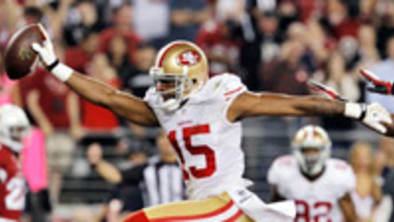 San Francisco 49ers Michael Crabtree (15) is pursued by New