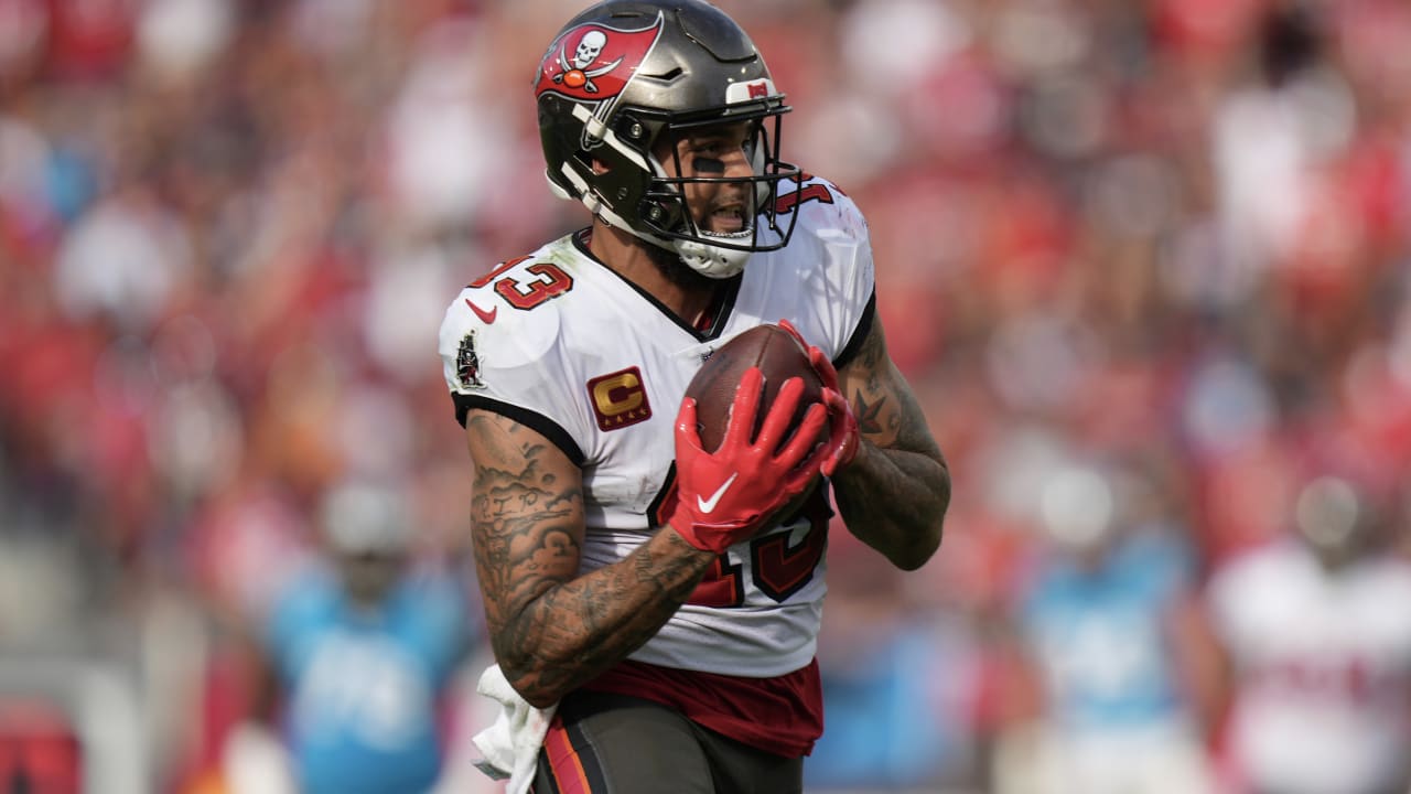 Tampa Bay Buccaneers wide receiver Mike Evans (13) points to a fan after  catching a touchdown pass during an NFL football game against the Chicago  Bears, Sunday, Sept. 17, 2023, in Tampa