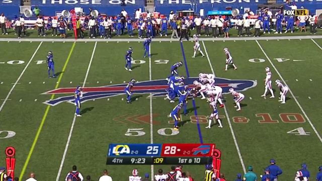 Buffalo Bills quarterback Josh Allen drops a pass in Bills wide