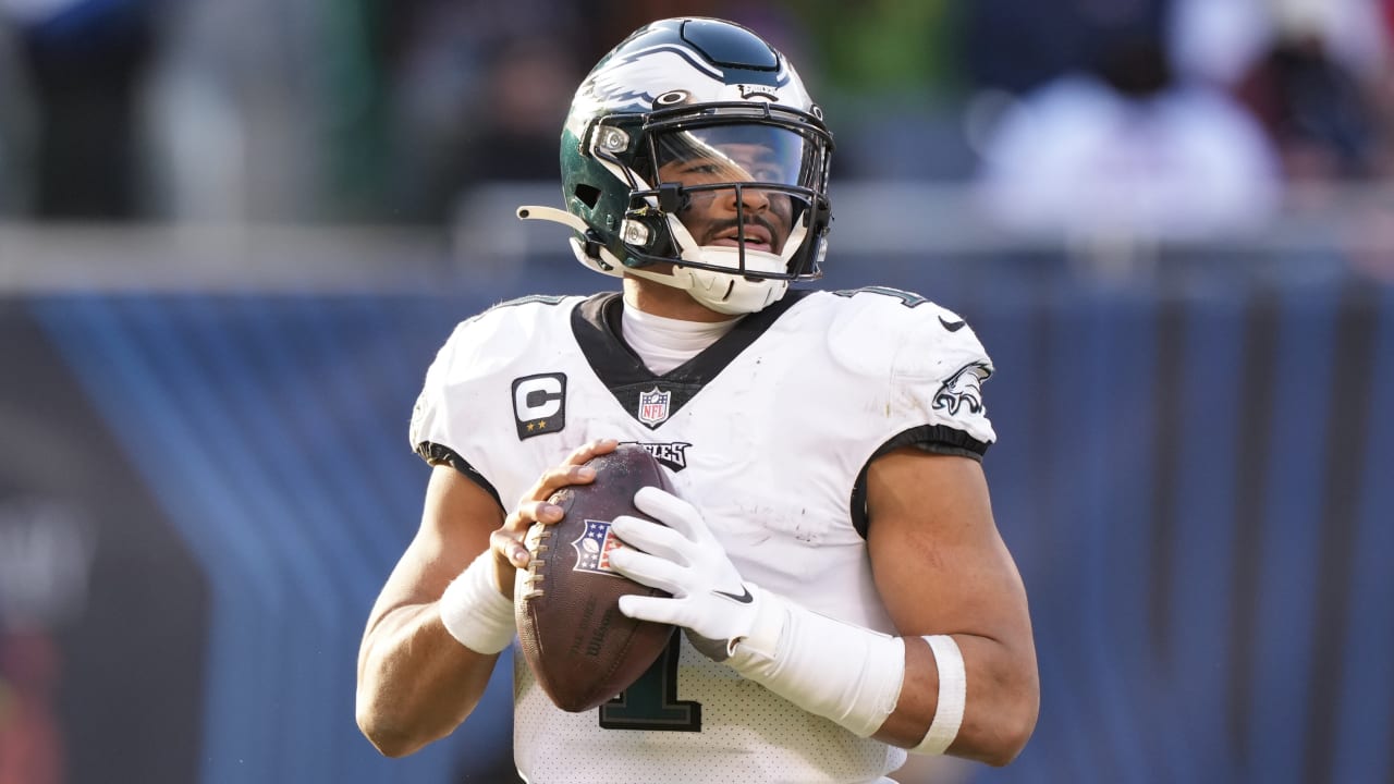 Philadelphia Eagles quarterback Jalen Hurts hits wide receiver DeVonta