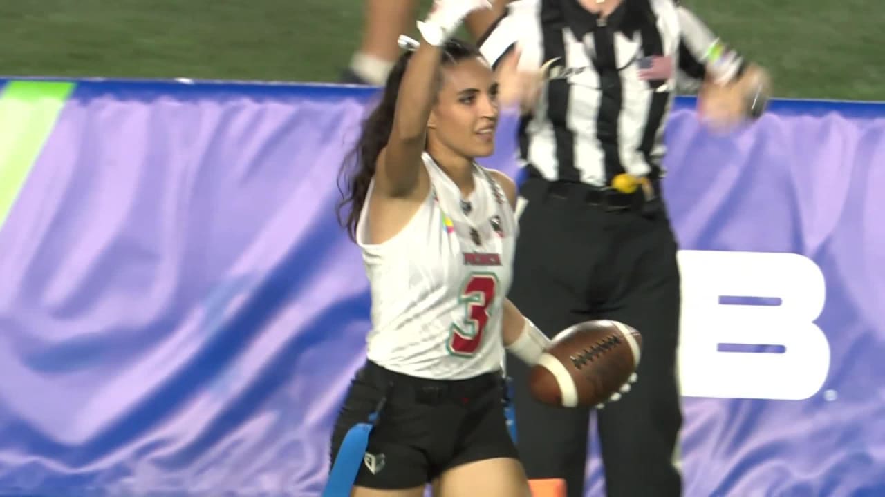 Flag football player Shiella Silva locates Silvia Contreras for a Team Mexico touchdown