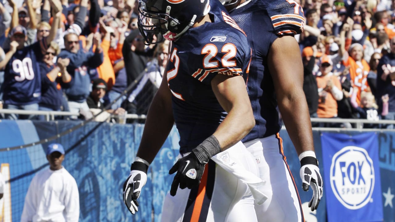 Chicago Bears running back Marion Barber (24) celebrates his touchdown  against the Minnesota Vikings with Bears wide receiver Roy Williams (11)  during the first quarter of their game at Soldier Field in