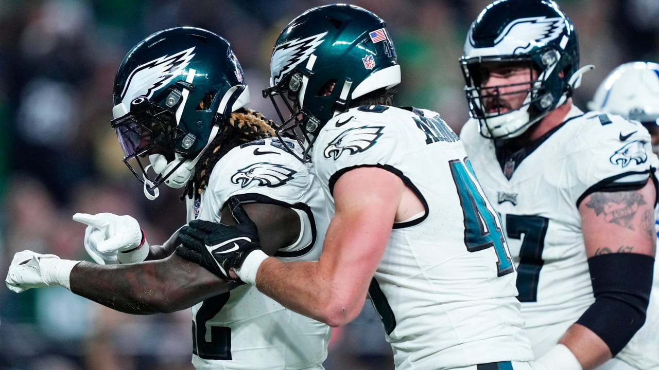 Philadelphia Eagles running back Trey Sermon stumbles across the goal line  for an opening-drive touchdown