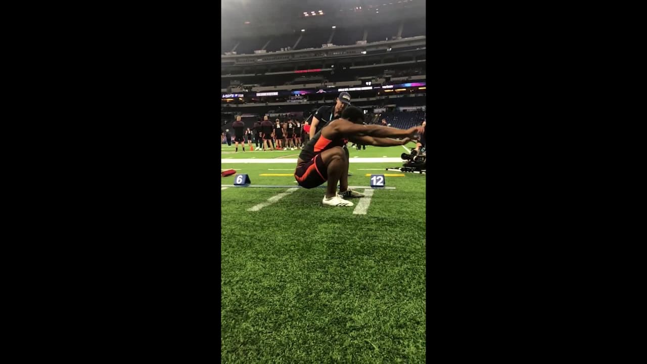 Oklahoma State running back Justice Hill leaps an official 10'10'' on