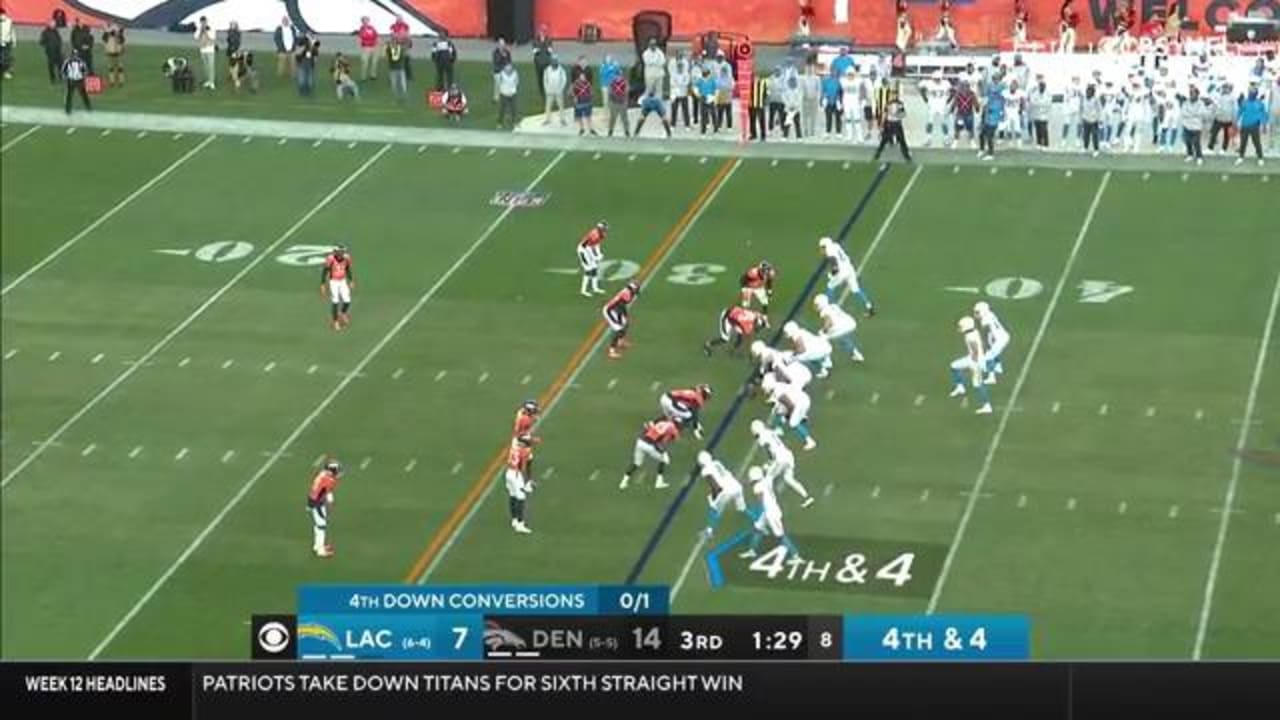 Los Angeles Chargers quarterback Justin Herbert navigates through