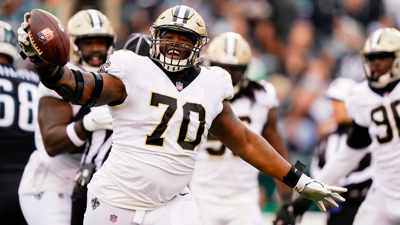 New Orleans Saints defensive lineman Christian Ringo punches ball from ...
