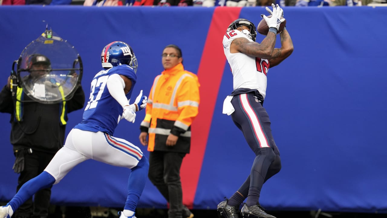 August 28, 2021: Houston Texans wide receiver Nico Collins (12) scores on  an 11-yard pass from quarterback Davis Mills (10) during an NFL preseason  game between the Houston Texans and the Tampa