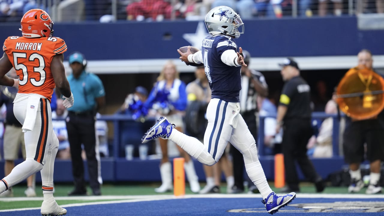 Dallas Cowboys quarterback Dak Prescott takes off for his first rushing