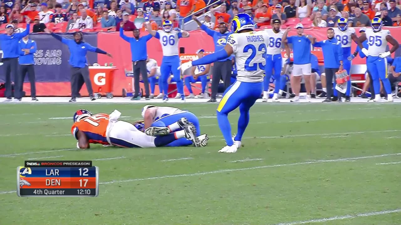 Los Angeles Rams linebacker Christian Rozeboom jumps in front of WR for