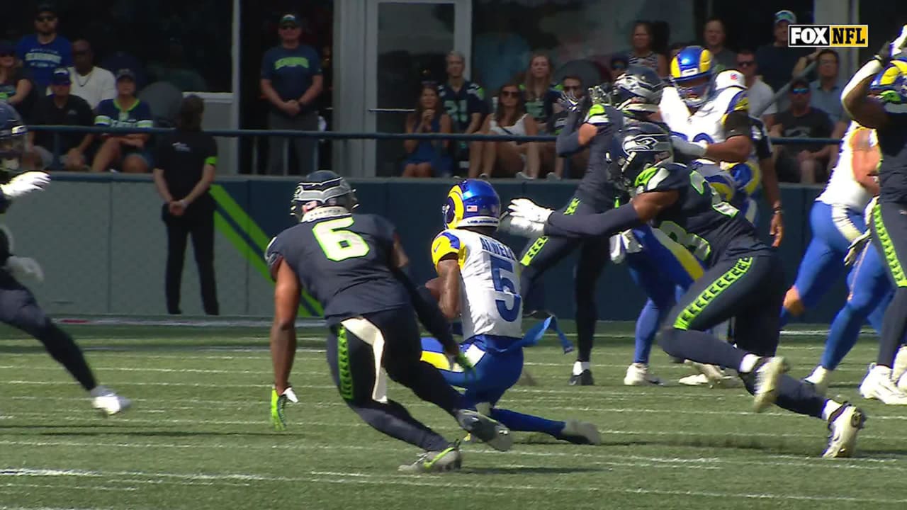 Los Angeles Rams quarterback Matthew Stafford unloads a 45-yard deep ball  to Rams wide receiver Tutu Atwell