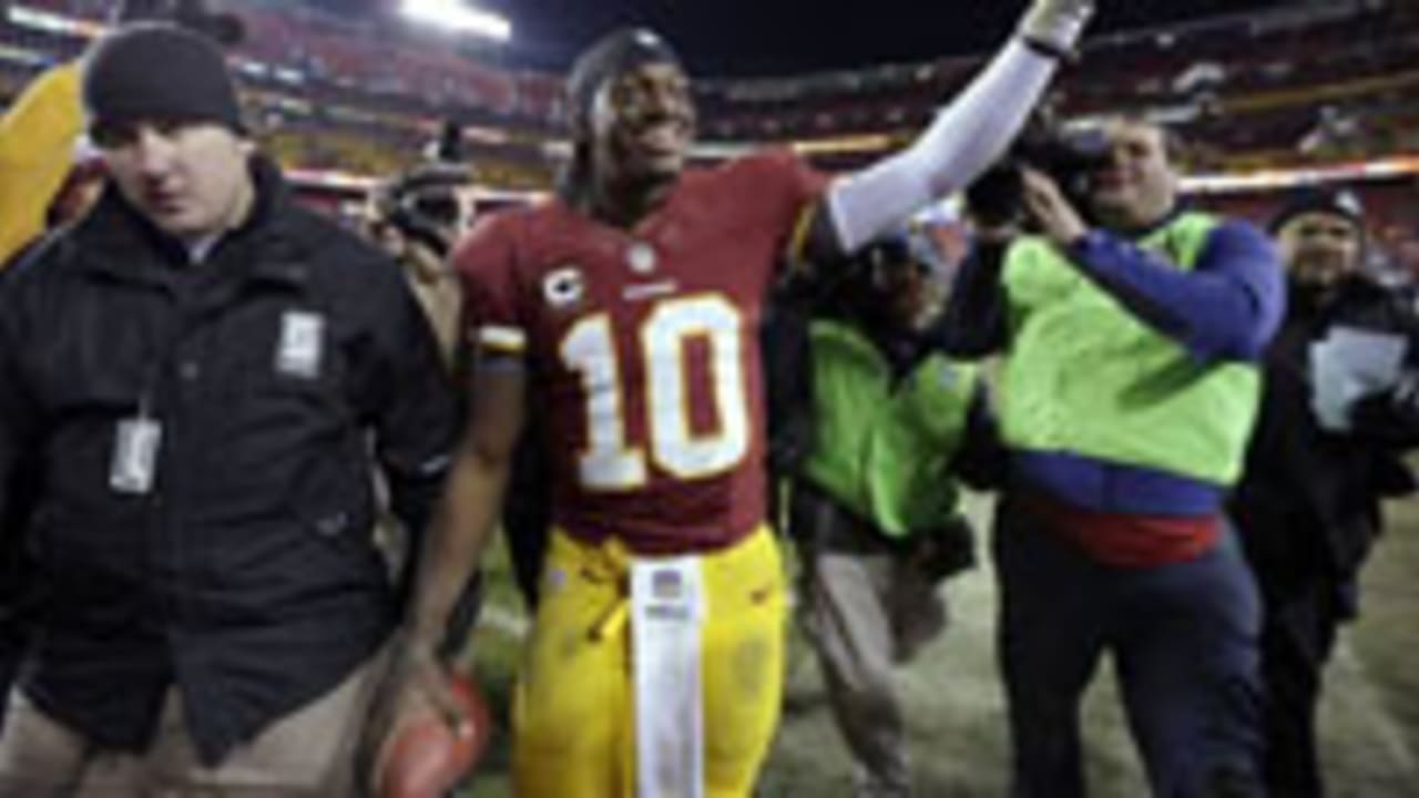 Redskins overcome RG3 injury to beat Ravens in OT