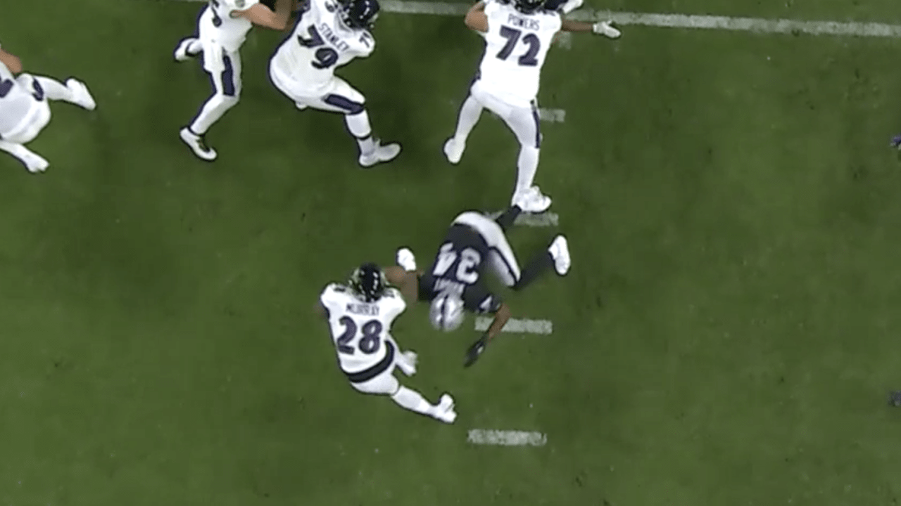 Raiders outside linebacker K.J. Wright (34) holds on to the football before  an NFL football gam …