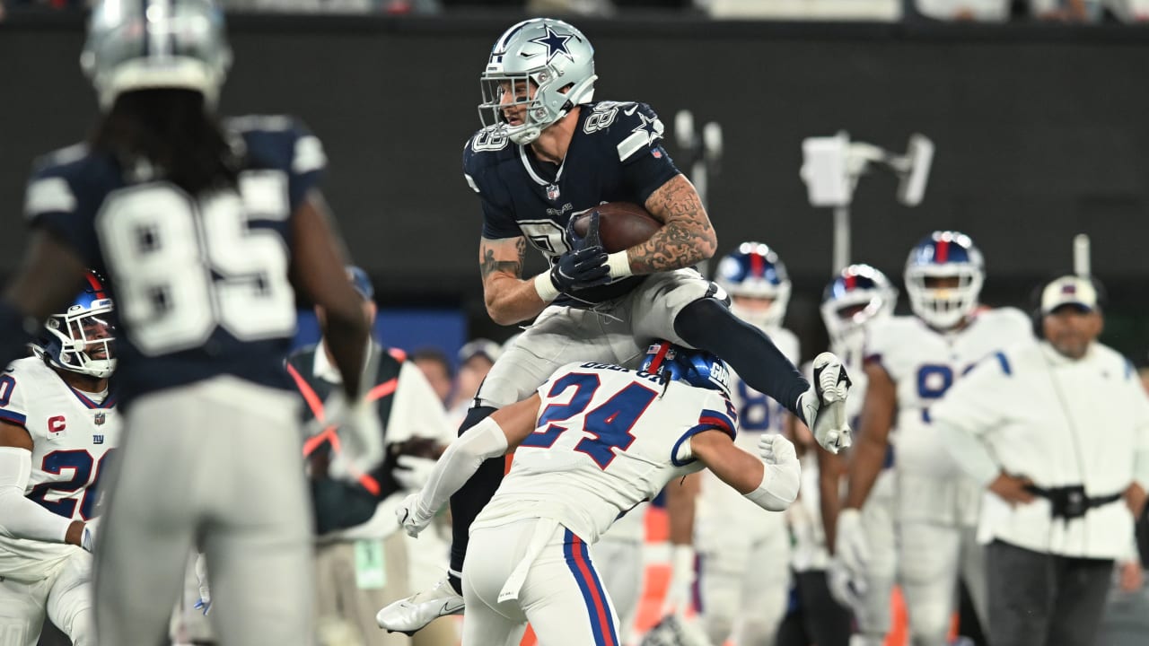 Dallas Cowboys tight end Peyton Hendershot takes to the air for hurdle over  New York Giants defender to earn Cowboys' first down