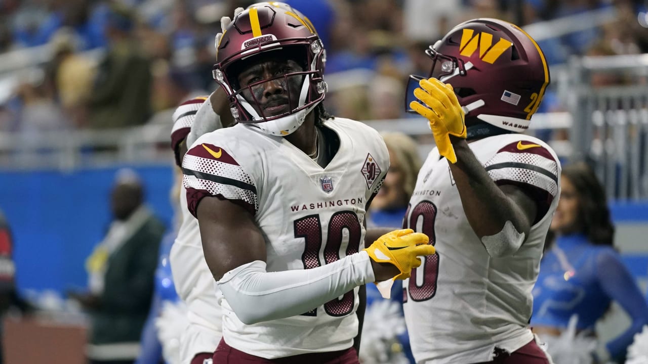 Washington Commanders wide receiver Curtis Samuel (10) gestures